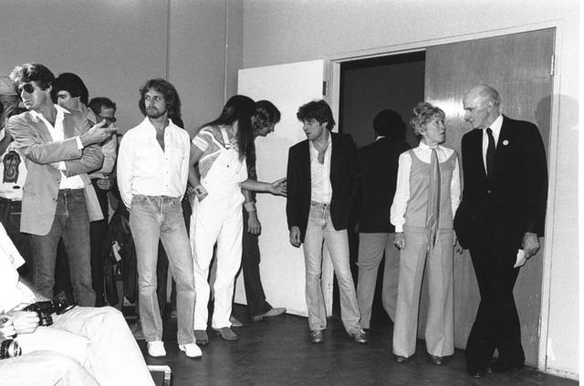 Joe Walsh, Don Felder, Timothy B. Schmit, Alan Cranston, Don Henley, Glenn Frey, and Norma Weintraub attend an event in 1980. (Photo by Michael Ochs Archives/Getty Images)