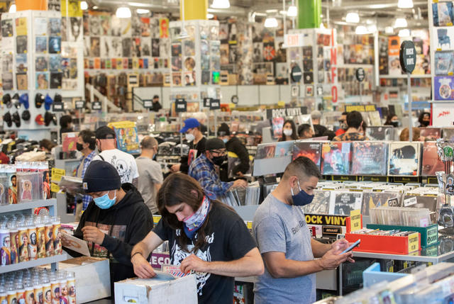 HOLLYWOOD, CA - APRIL 01, 2021: Customers shop inside Amoeba Music on Hollywood Blvd. in Hollywood that reopened in a new location after being shuttered for a year due to the coronavirus outbreak. (Mel Melcon / Los Angeles Times via Getty Images)