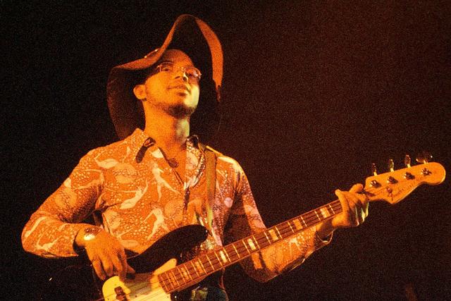US blues band War performing on stage, London, 1976, BB Dickerson. (Photo by Michael Putland/Getty Images)